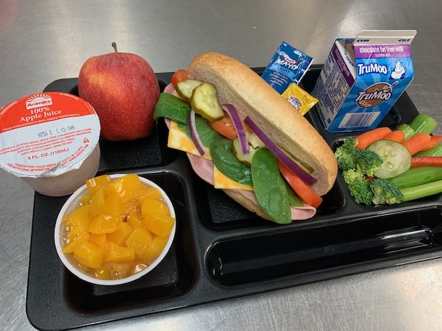 school meal with lots of fruits and veggies